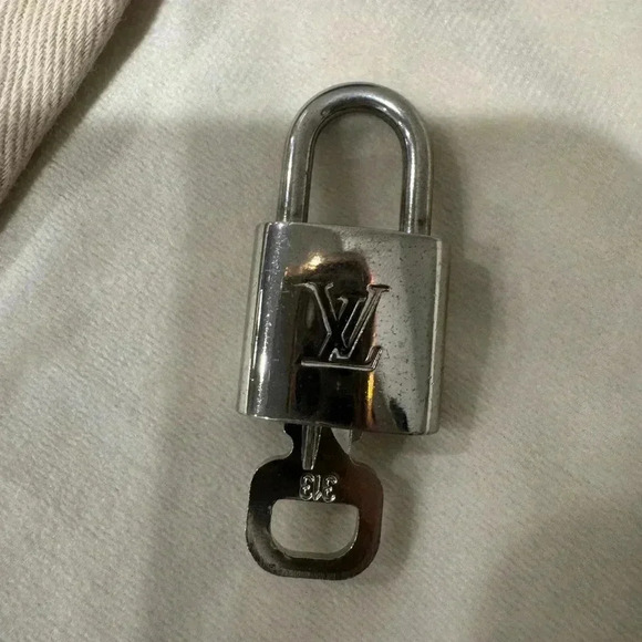 LV Silver Lock and Key in Dust Bag - Picture 3 of 5